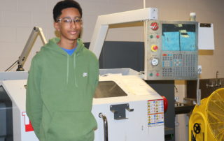 The Career Academy manufacturing student