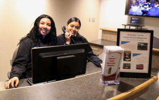 Hospitality students practice skills at front desk
