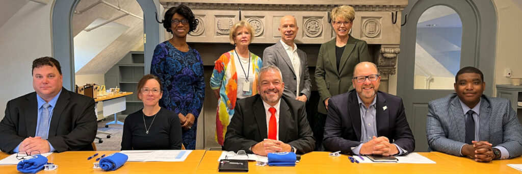 Image of CTECS Board Members. Back row, L to R: Commissioner Charlene Russell-Tucker, Patricia Keavney, Dr. George Anderson, Dr. Ellen Solek Front row, L to R: Todd Berch, Christine Benz, Jim Gildea, DECD designee, Lance Hall