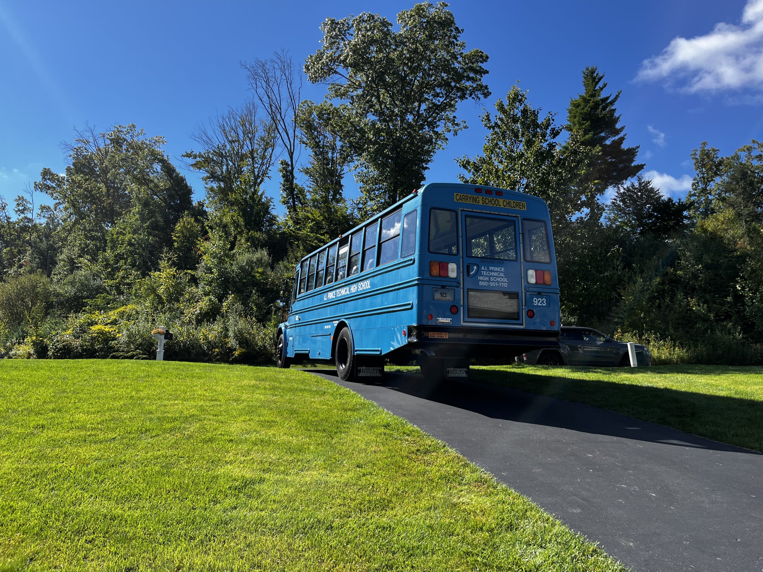 Image of blue CTECS Student Workforce bus from A.I. Prince Technical High School