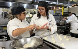 Image of Oliver Wolcott Technical High School Culinary Students preparing Hispanic Heritage Month menu items
