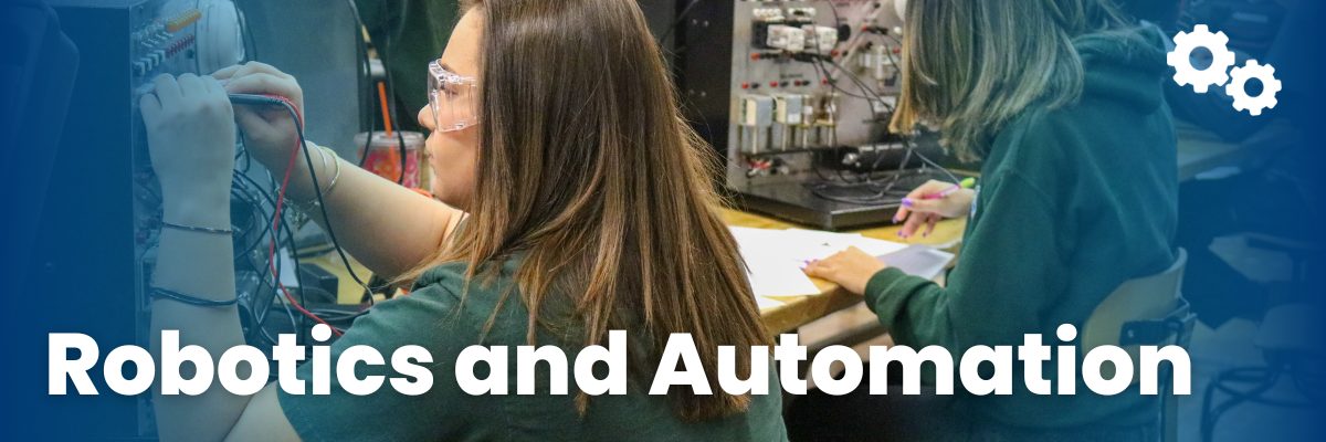 Female student working on an electrical panel with the words "Robotics and Automation"